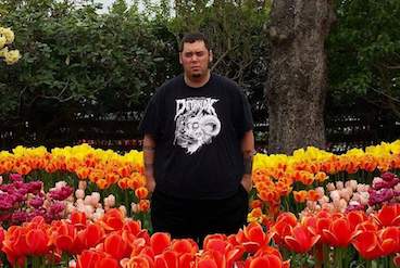 Ron looking dour in a field of tulips